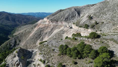 Scenic-Route-through-mountains-from-Marbella-to-Ronda-in-Andalusia,-Spain---Aerial