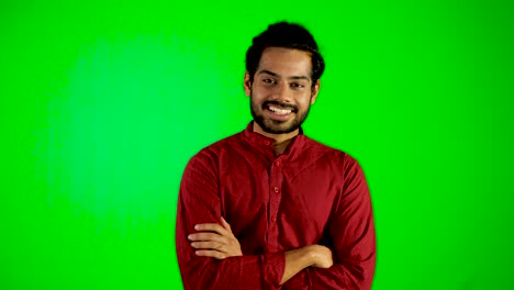 indian-guy-looking-camera-arab-person-looking-camera-with-green-screen-,-green-background