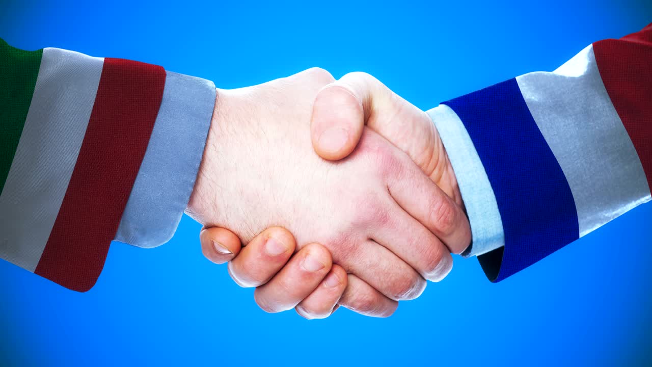 italia - francia animación conceptual de apretón de manos sobre países y política con el canal matte /