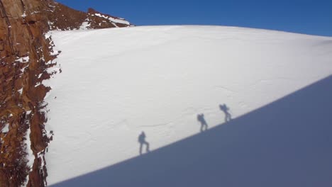 hikers on a snowy mountain