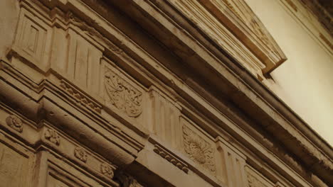 caltagirone, sicily, detail of a baroque facade building in the night