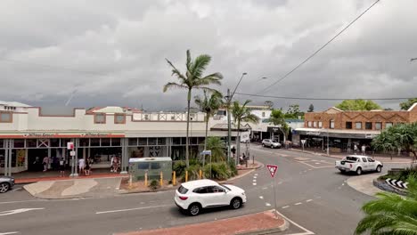 vehicles and pedestrians navigating a crossroad