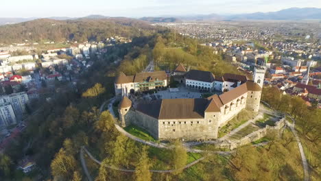 Point-of-drone-view-Ljubljana-castle,-one-of-the-most-important-landmarks-of-the-city,-Slovenia