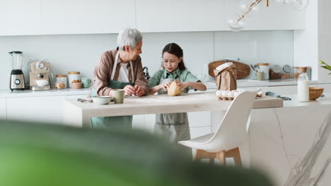 grandma and girl baking