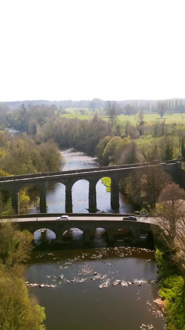 Ultra-wide social media ratio aerial video of Randalstown Viaduct and Cycle Path in Randalstown, County Anrim in Northern Ireland. Filmed in 1080x1920, 60FPS and with Rec709 color