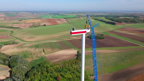 Construction-Of-A-New-Wind-Turbine-During-Summer---aerial-shot