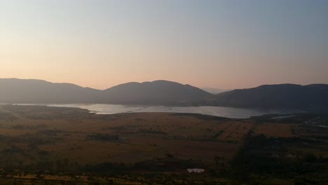 Lake-and-mountain-range-reveal-at-twilight