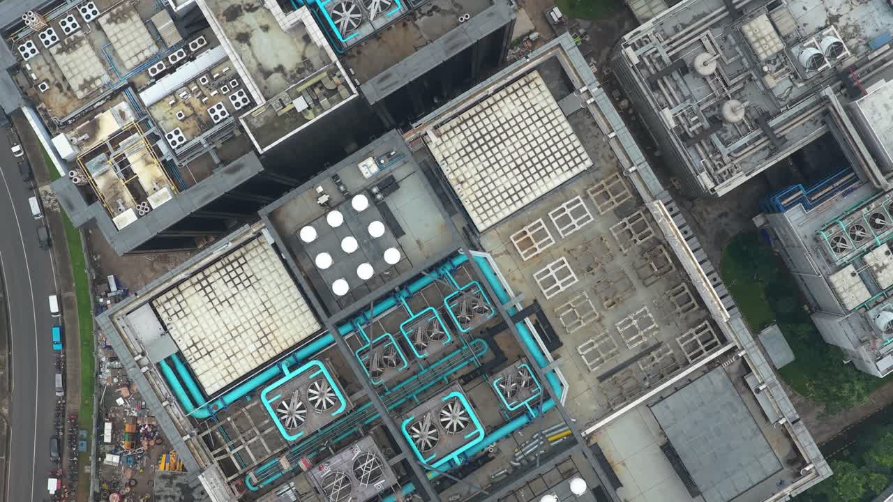 High angle aerial view of a large data center complex in jakarta, indonesia. Rooftop ventilation and cooling systems are visible