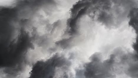 a thunderstorm inside the thick, moving cumulus cloud