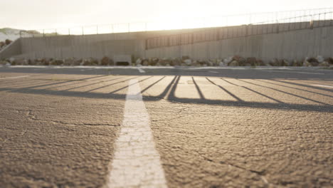 empty beach car park spaces covered in asphalt.