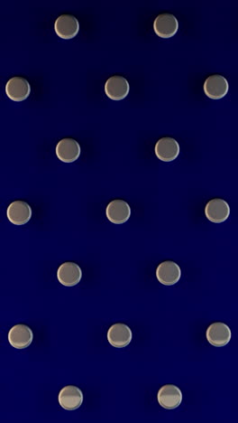 silver circles on a dark blue background