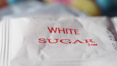 small packet of white sugar