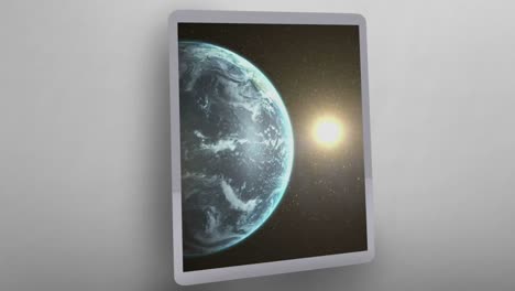 animation of globe spinning on a touch pad screen