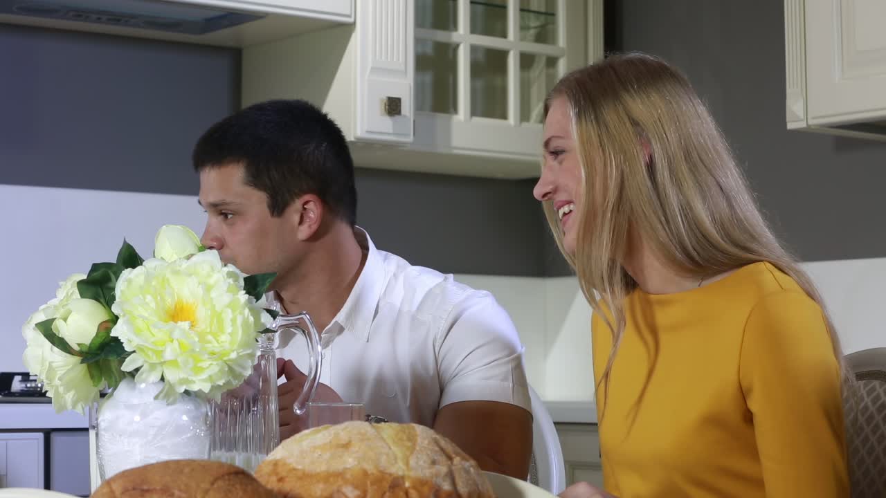 Family having breakfast at the table