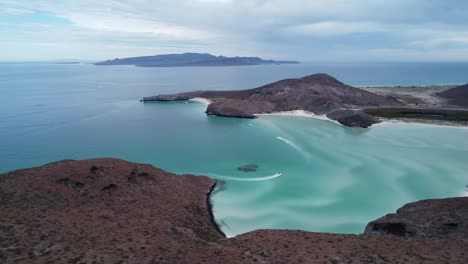 balandra beach in baja california, mexico showcasing turquoise waters and sandy isles, aerial view