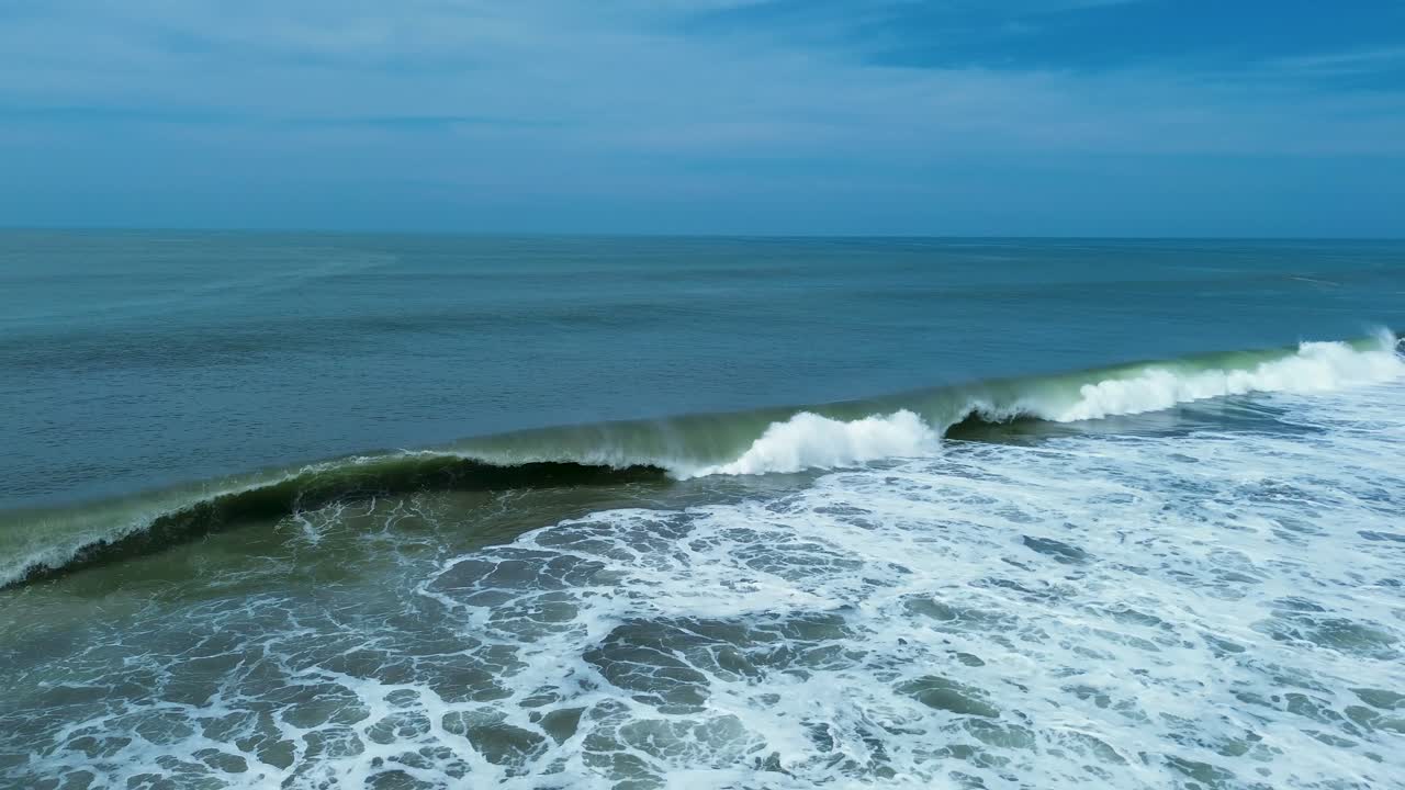 Drone aerial landscape of La Barra de Colotepec sea waves breaking on beach shoreline sandbar ocean Puerto Escondido Mexico travel surfing tourism bay