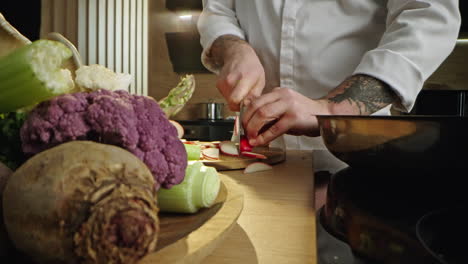 chef preparing fresh vegetables in the kitchen