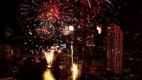 the real fireworks celebration colorful sky in the background black and the text happy new year 2020.