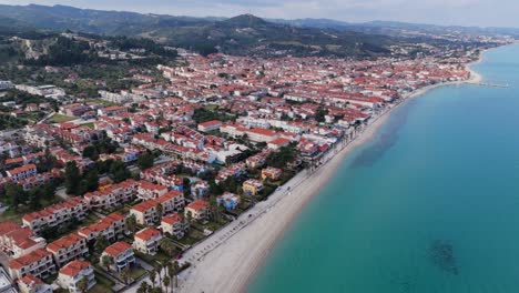 Aerial-drone-view-of-Pefkohori-beach-in-Halkidiki,-Greece