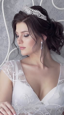 beautiful bride in wedding dress and crown