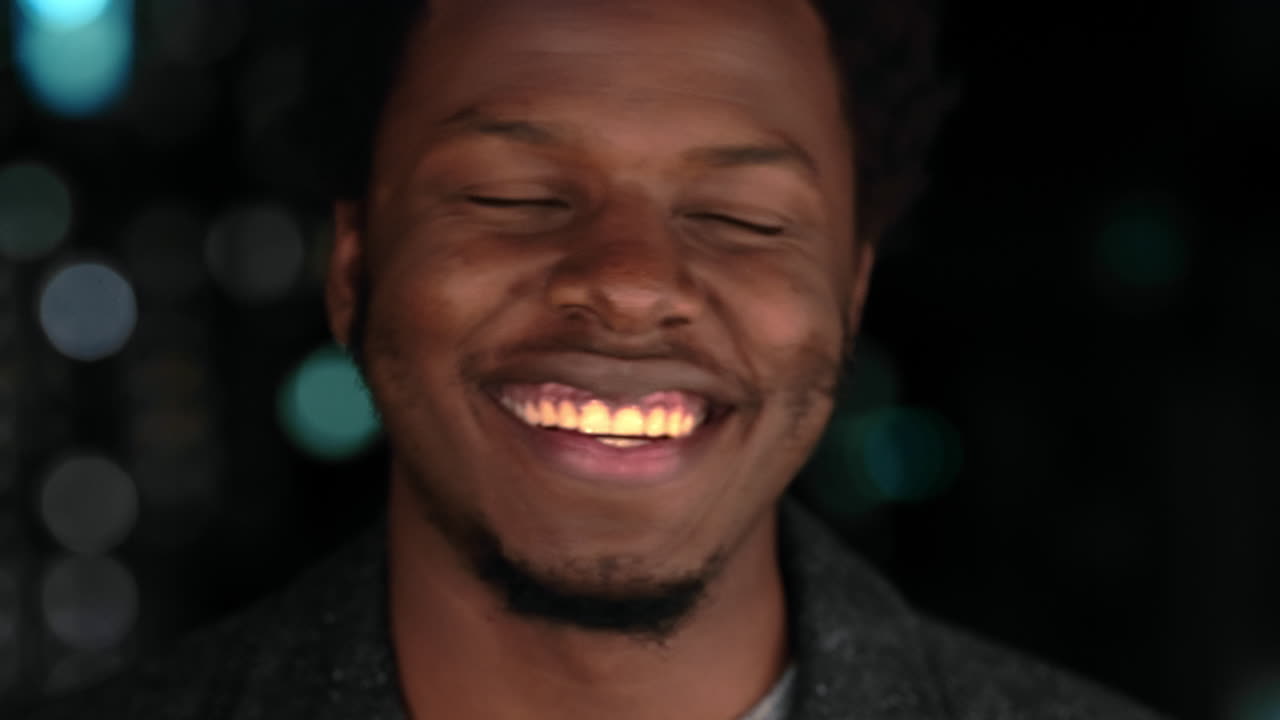 Black man, face and beer bottle at night