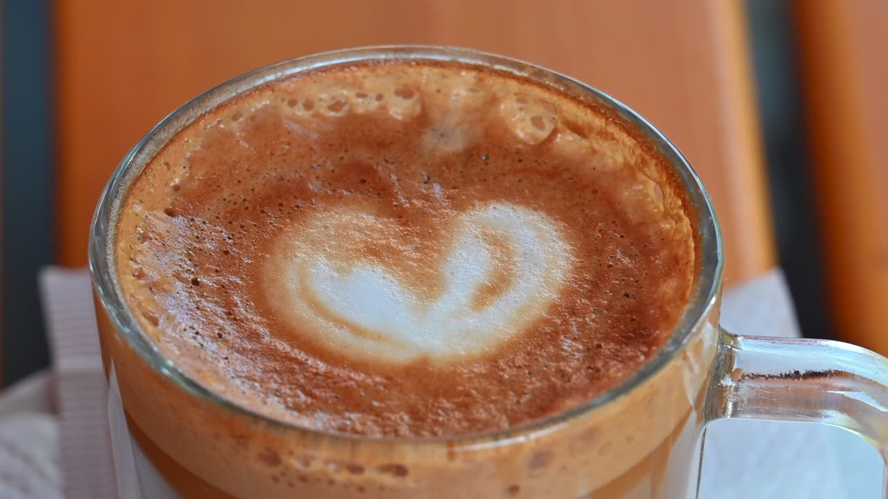 Brown coffee cappuccino with heart shape