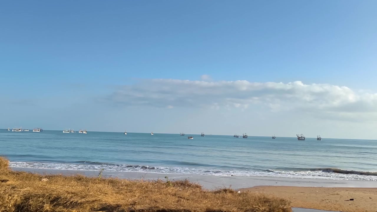 Fishing Boats Anchored in Calm Tropical Ocean Waters