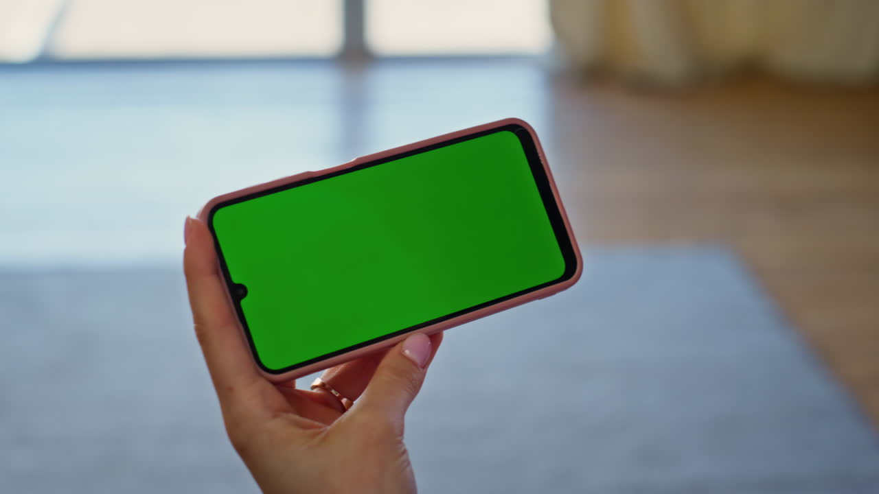 Girl finger tapping mockup mobile phone making online order at home closeup