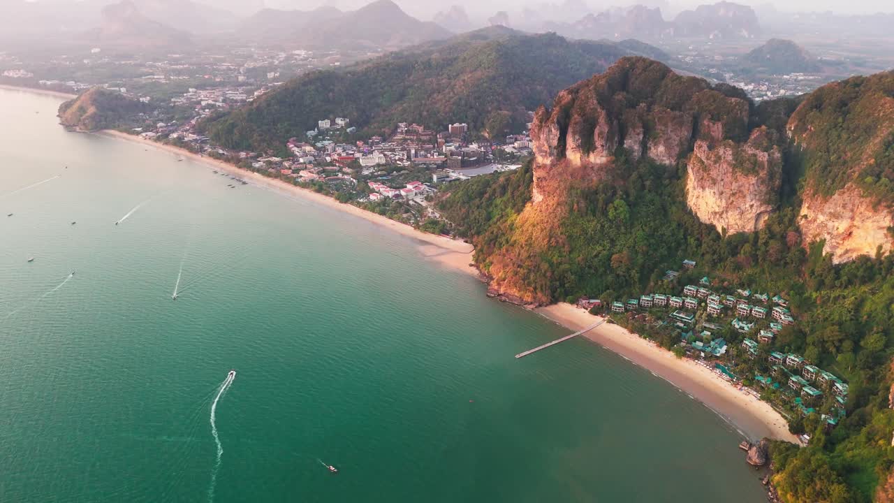 Aerial sunset view of Krabi southern Thailand Ao Nang resort town beach