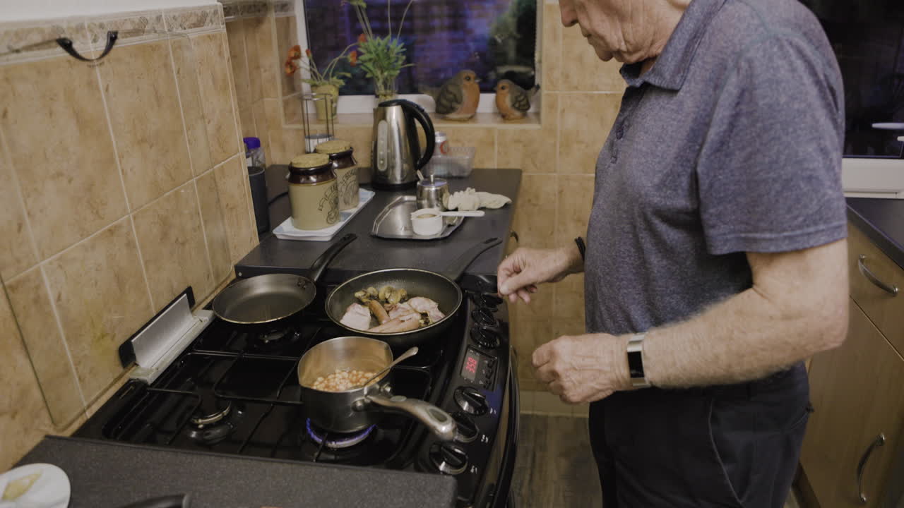 Man cooking food in kitchen