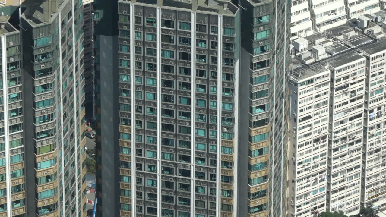 High rise building apartment exterior during the day High angle close up