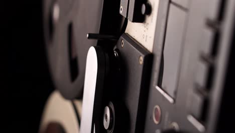 Vertical-Video,-Professional-Magnetophone-and-Spinning-Reel-to-Reel-Tape,-Close-Up