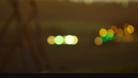 car light on night with telephone antenna on foreground. animation of bubble light