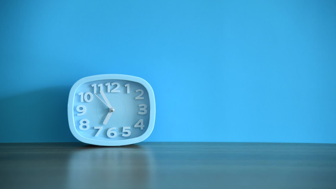 Modern alarm clock on the table