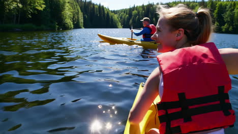 two people kayaking on a sunny lake