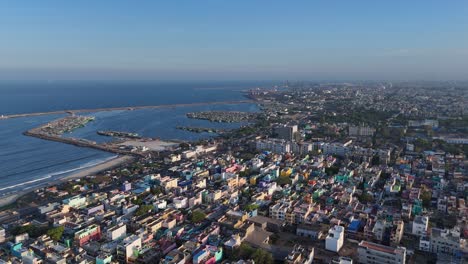 top-down aerial of kasimedu fishing harbor bustling with morning activity