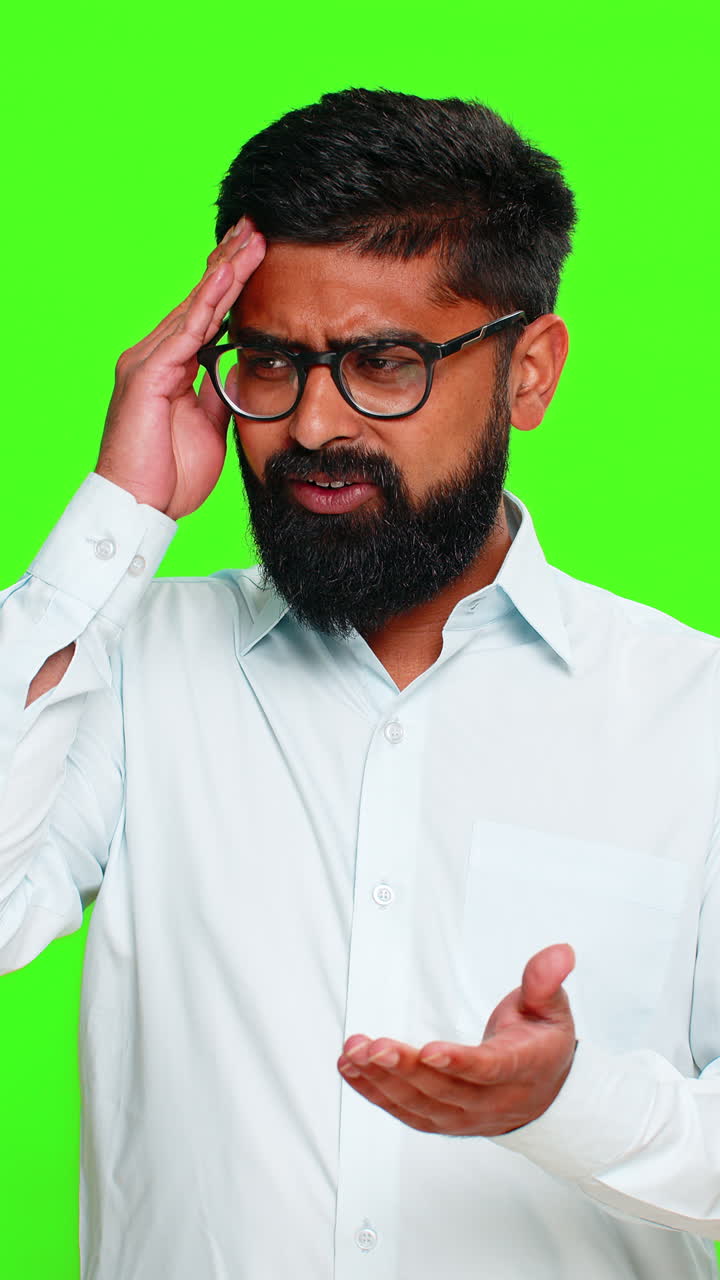 Indian man facepalm gesture slapping forehead with hand shows regret frustration mistake realization