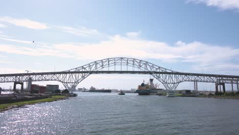 Aerial-shot-of-a-historic-Harbor-Bridge-in-downtown-Corpus-Christi-that-goes-over-the-ship-channel-along-the-highway