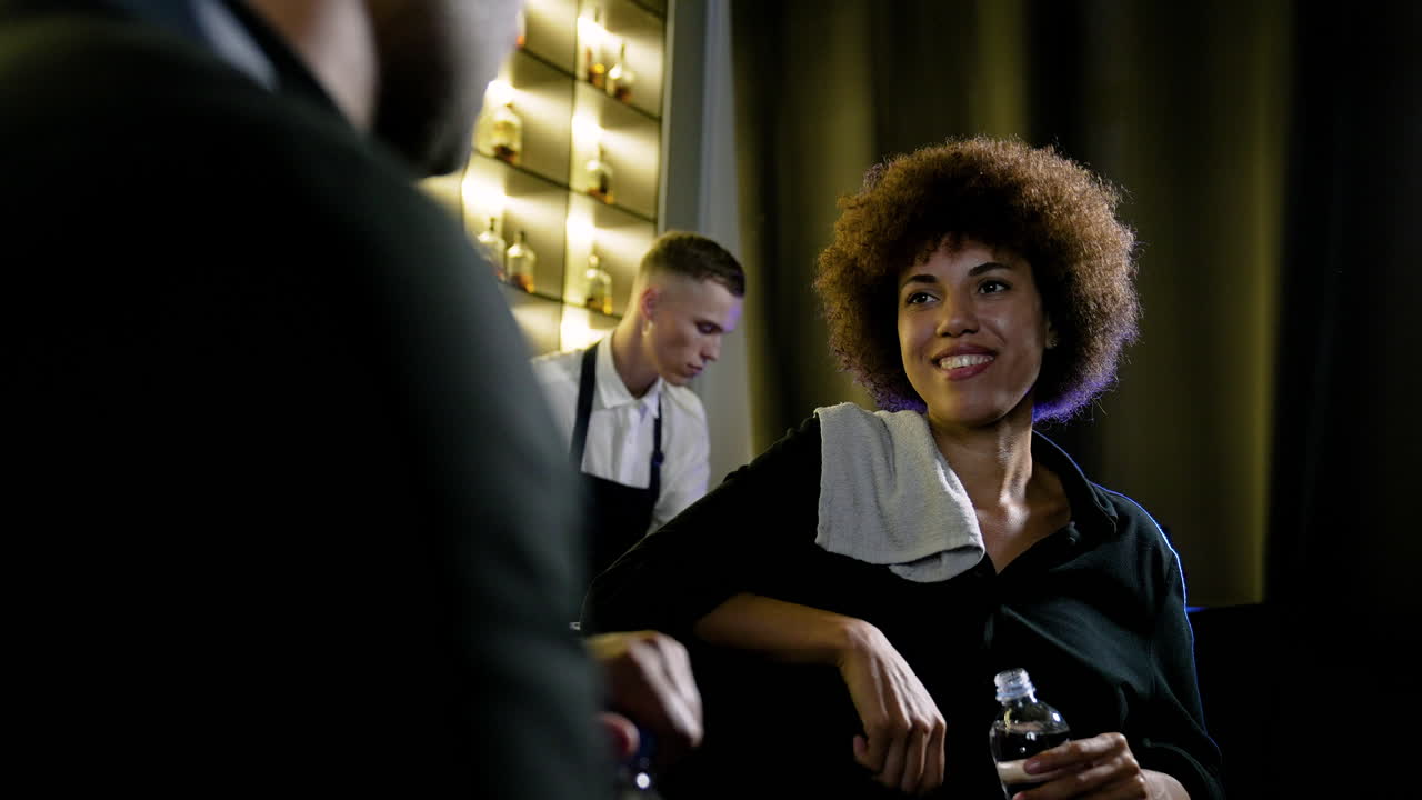 Bartenders resting from work in the pub