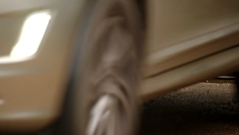 close-up-of-a-silver-car-going-over-a-cattle-grid-in-the-New-Forest