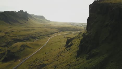 an epic drone footage of a road in iceland