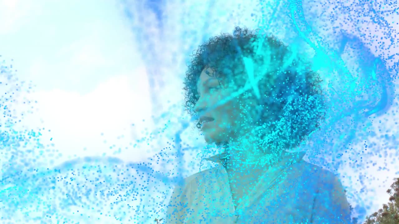 Woman turning head while animated blue ribbons entering left swirling across face, showcasing tech