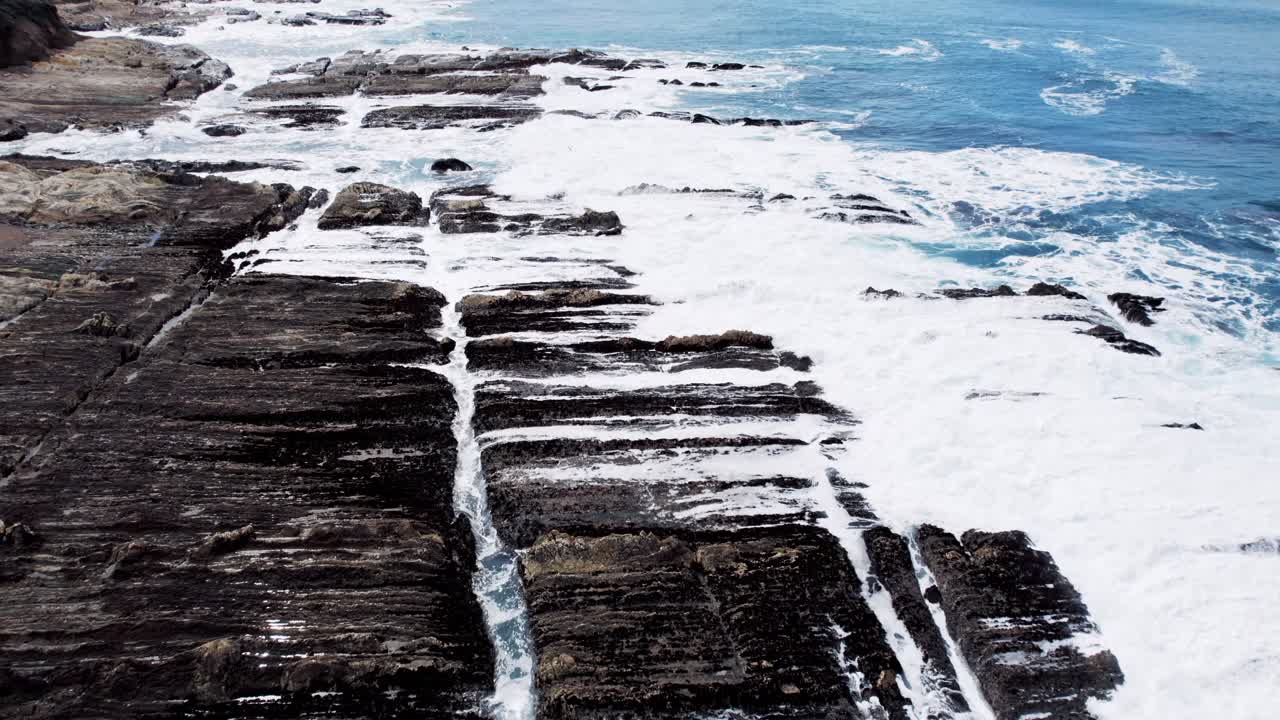 Dramatic Ocean Cliffs on the West Coast with Waves Crashing Against Rocks
