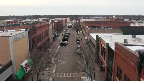 aerial, main street in a small town in the united states during winter season