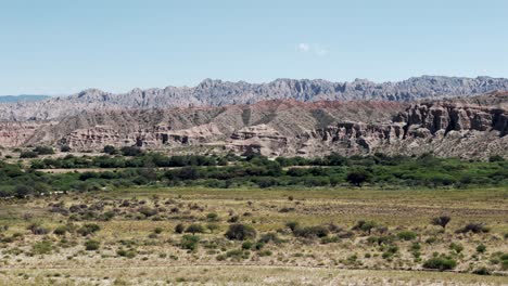 drone advancing over mountains in the beautiful cachalquie valley in salta