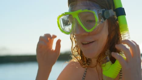 woman with snorkels in the beach 4k