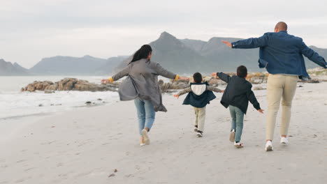 playful, beach and family running together