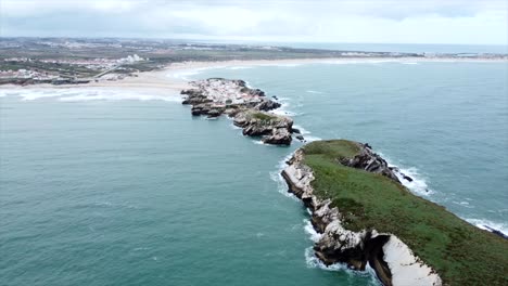 drone shoot of a beauty town in the middle of a island in the ocean