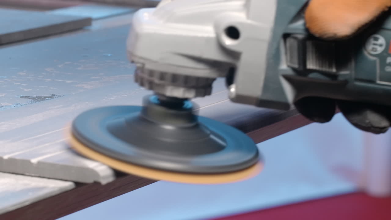 Using a Grinder to Polish Tile or Wood Trim