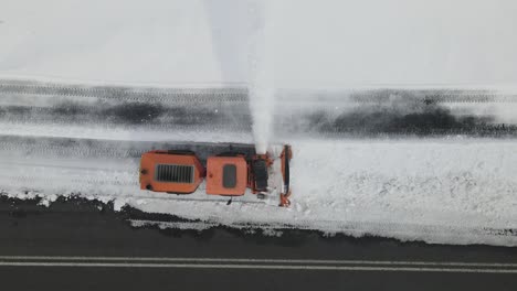 Snowblower-Working-Asphalt